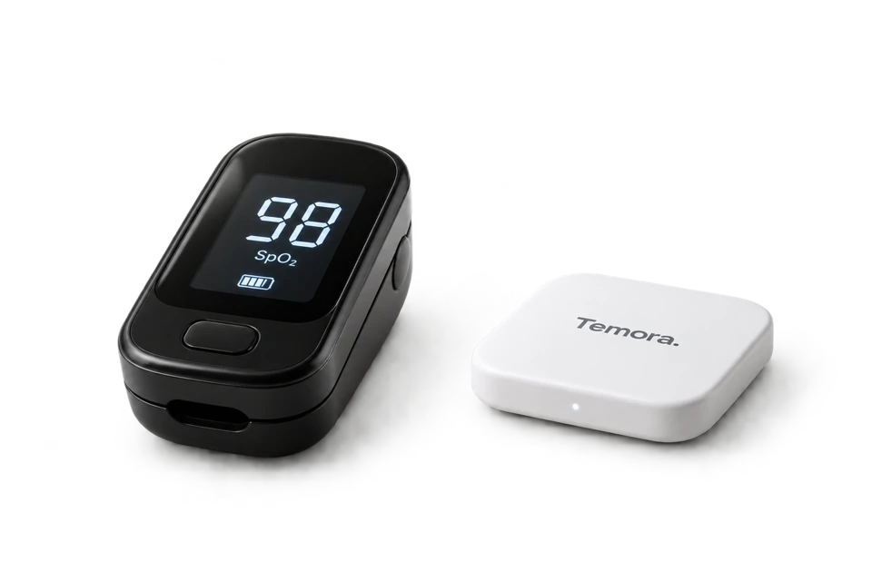 Illustrative oximeter alongside a small thin TEMORA hub